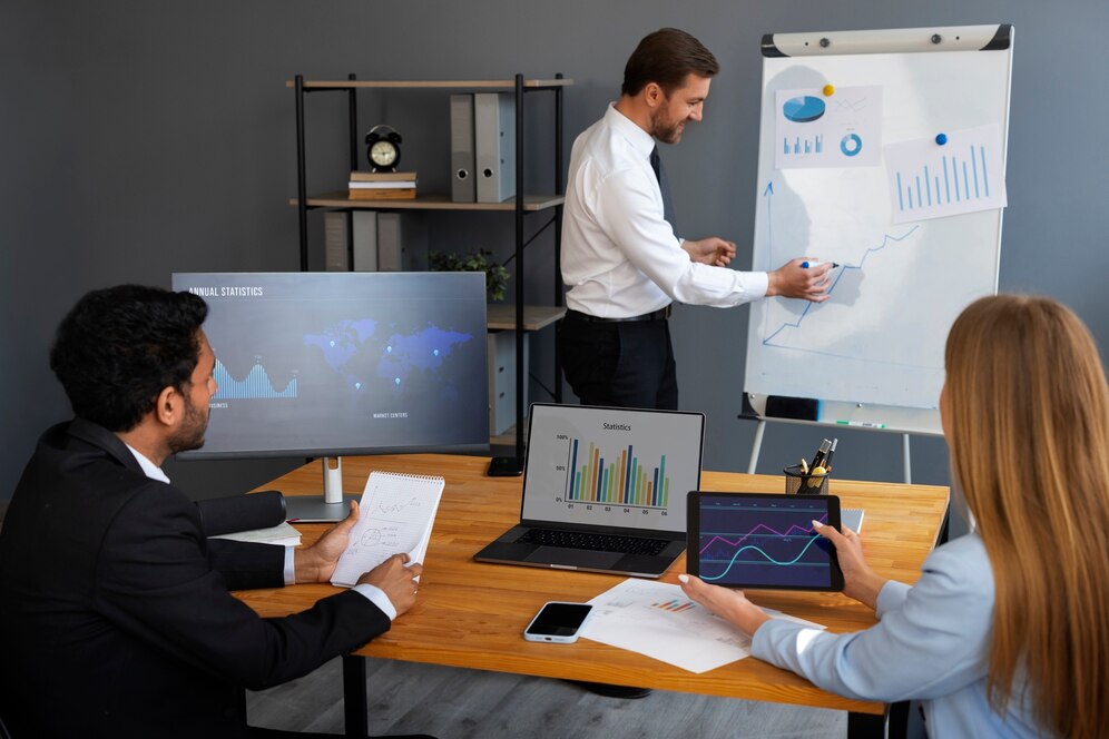 Inabia consultants reviewing delivery metrics in a strategy session