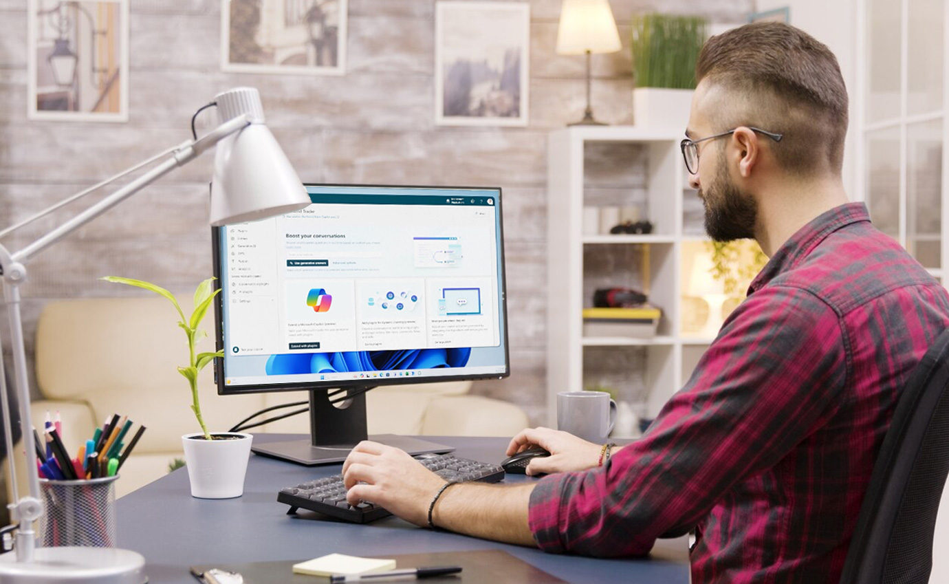 An Inabia specialist working with an AI dashboard built in Copilot Studio