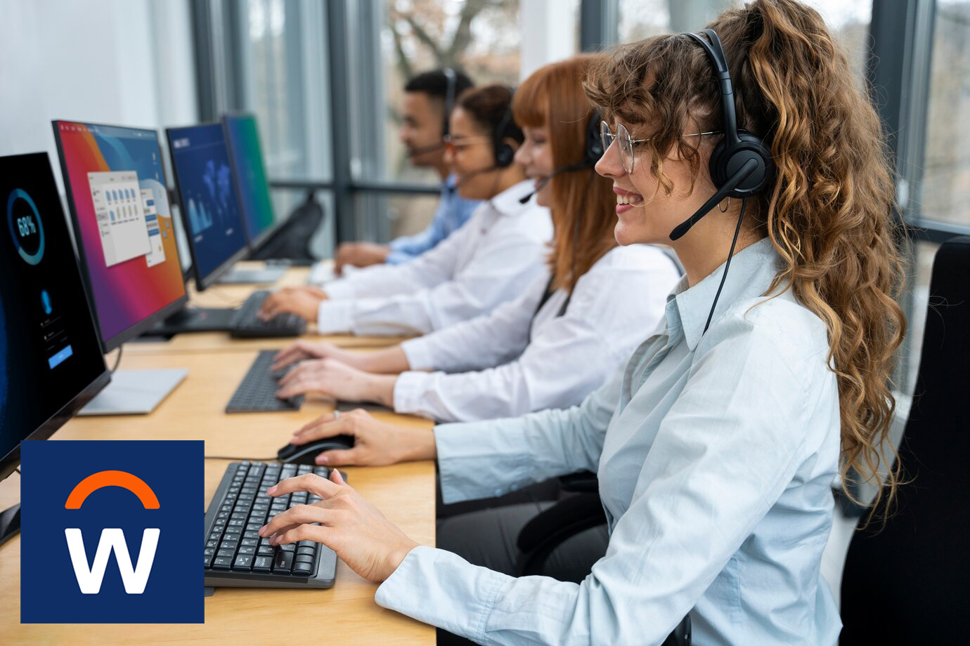 An HR and finance team working in Workday