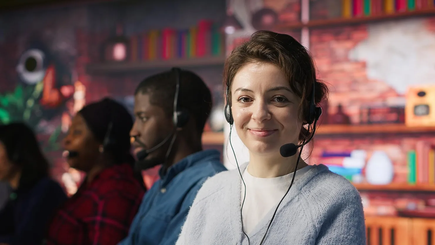 Inabia support specialists at their desks responding to client enquiries